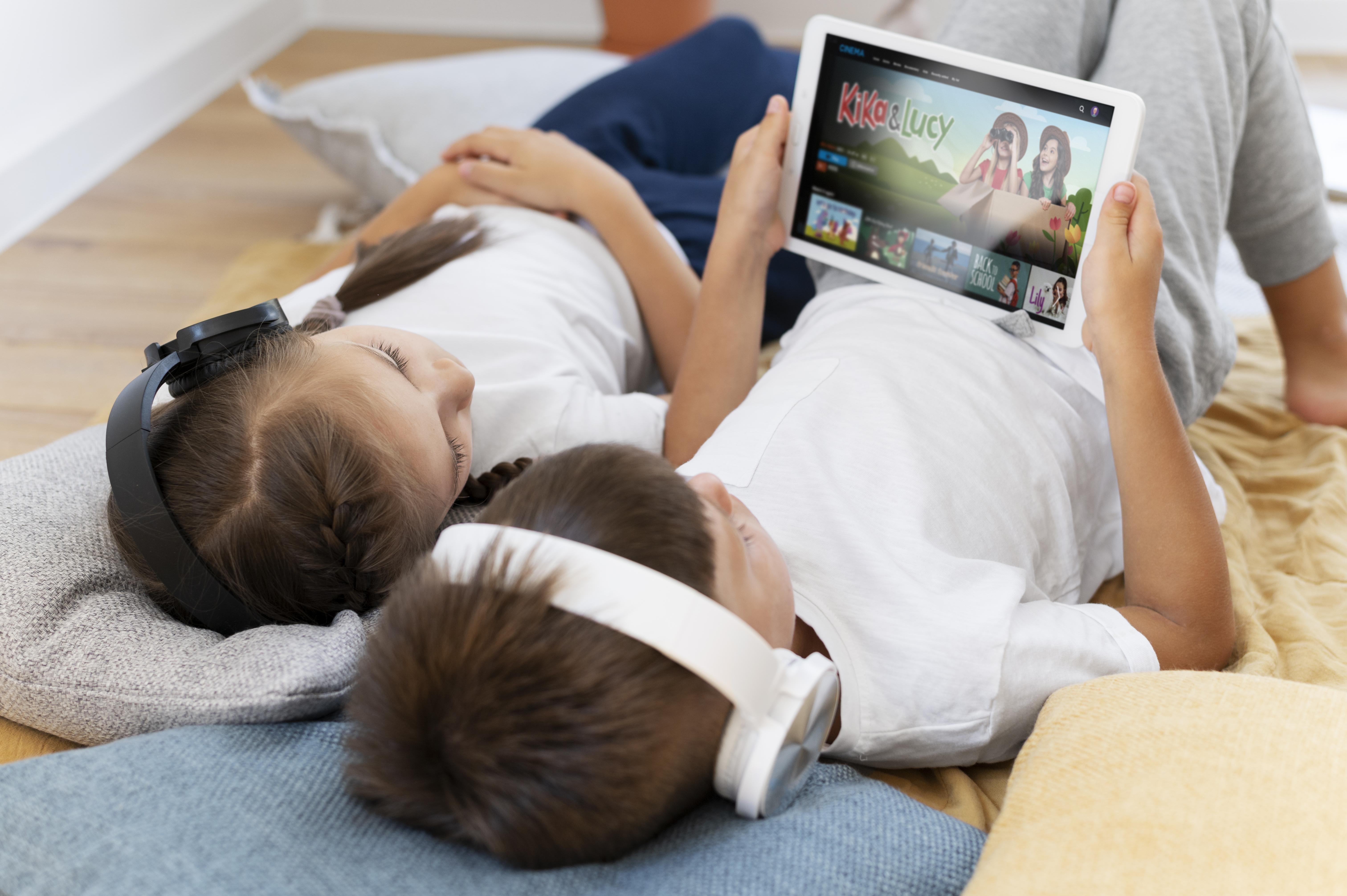 Kids and family watching television